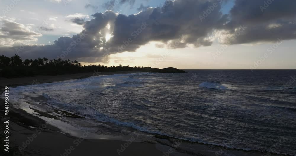 Sunset over the beach at Arecibo Puerto Rico with a drone over a Rocky Shore 1