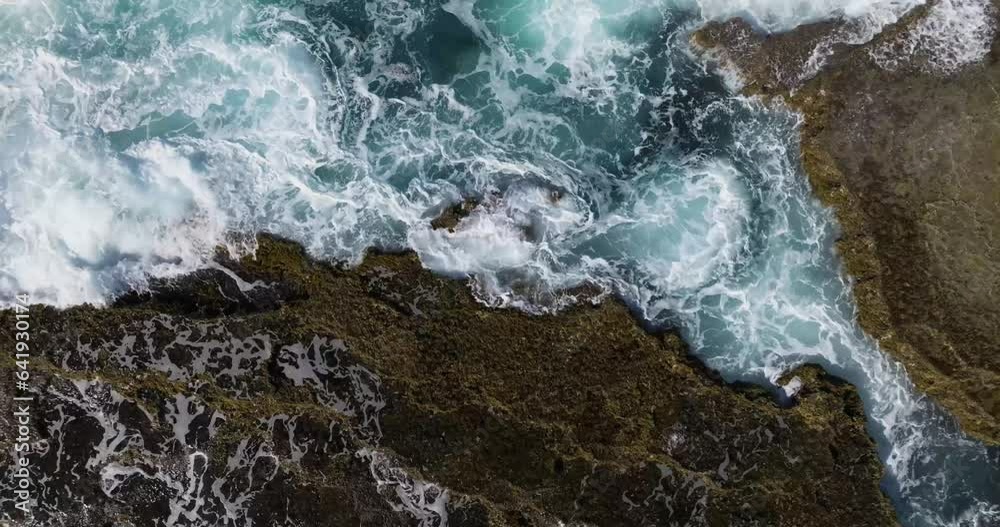 Rocky Shore formation at the Beach on Arecibo Puerto Rico with waves hitting the rocks