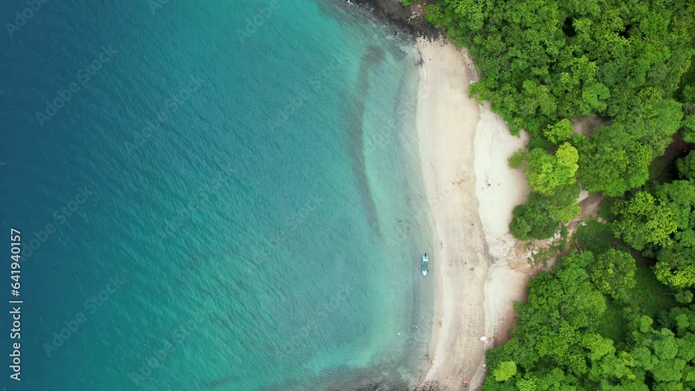 Beautiful aerial footage of Playas del Coco, Hermosa Beach and its green mountains, bay and yachts in Costa Rica