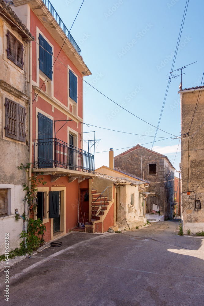 Picturesque street in Valaneio village, Corfu, Greece