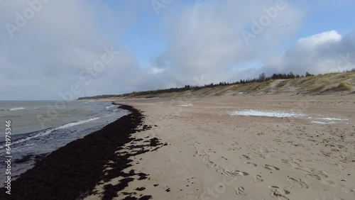 Beach and sea on cold dar day