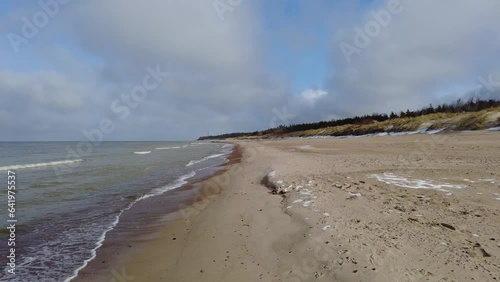 Beach and sea on cold dar day