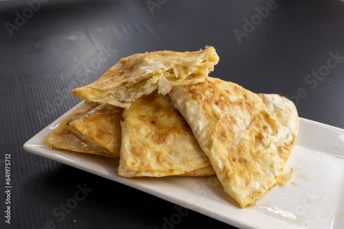 fried tortilla on a white plate. snack.food concept.