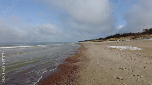 Beach and sea on cold dar day