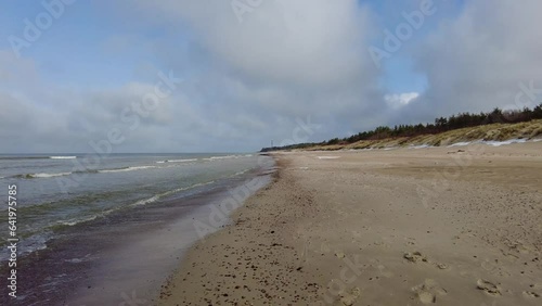 Beach and sea on cold dar day