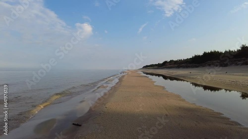 Beach and sea on cold dar day