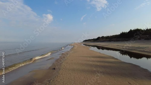 Beach and sea on cold dar day
