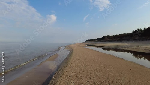 Beach and sea on cold dar day