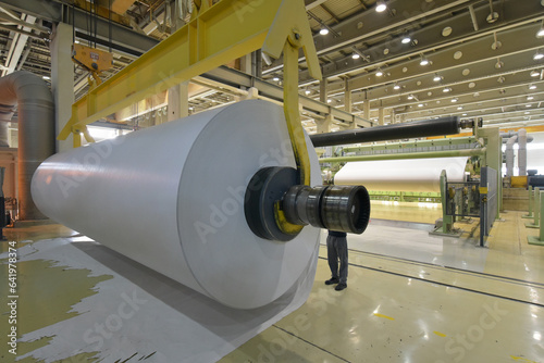 paper mill - production of paper rolls for the printing industry - paper rolls in a factory