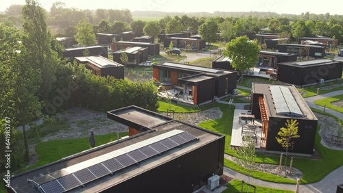 Flying Over The Lodges With Sola Panels On The Roof In Roompot Beach Resort Brouwersdam In Zeeland, Netherlands. - aerial photo