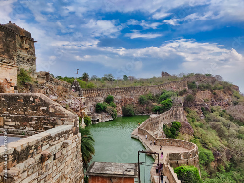 Picture of Gaumukh Kund at Chittorgarh Fort shot during daylight against white clouds and blue sky photo