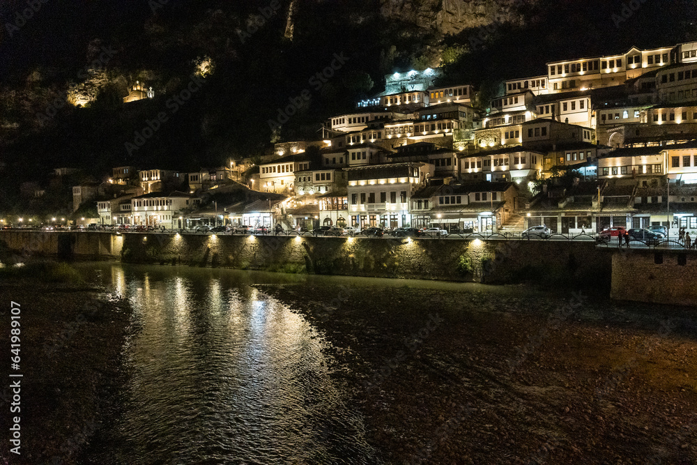 Beautiful river in the illuminated historic city of Berat in Albania, UNESCO, the city of a thousand windows