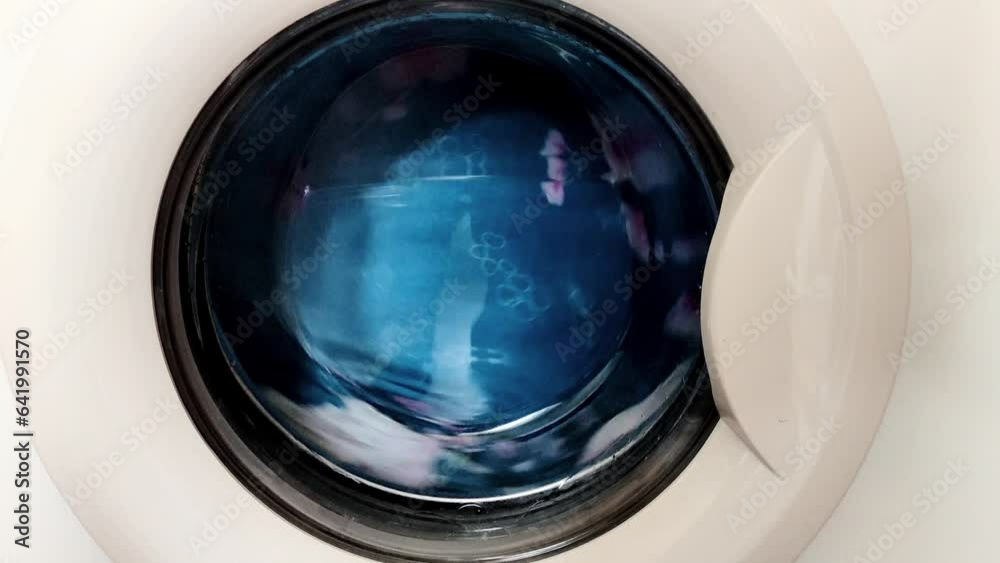 Washing machine spins and washes clothes Washing machine spins and washes clothes