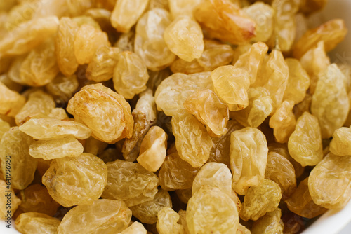 Yellow raisins close up