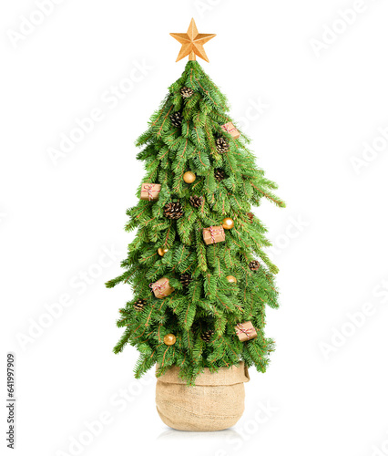 one Christmas tree in a burlap pot with Christmas decorations on a white isolated background