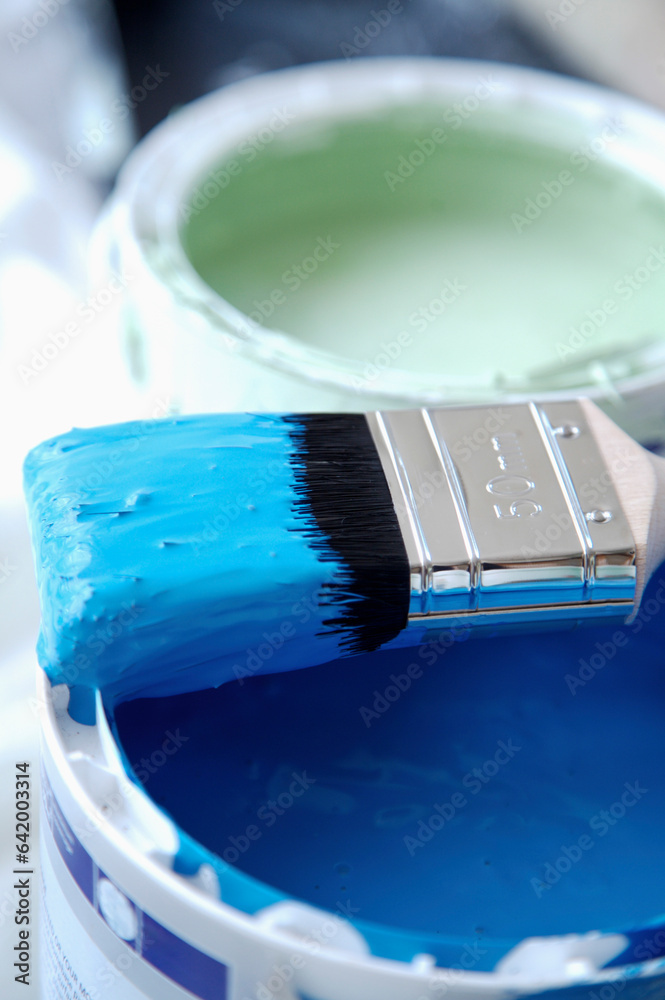 © fStop - Close up of blue paint pot and paintbrush © fStop - Close up of blue paint pot and paintbrush