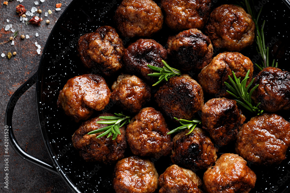 Tasty meat food and homemade food concept - meatballs