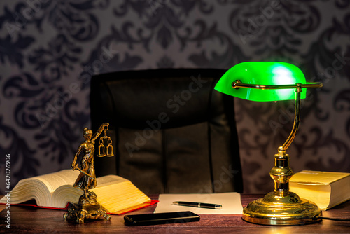Obraz na płótnie office of a lawyer with statue of Lady Justice, goddess Justitia, on the desk