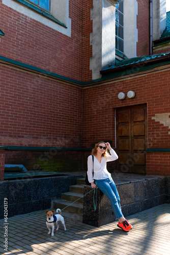 Walking around the city with your dog in summer