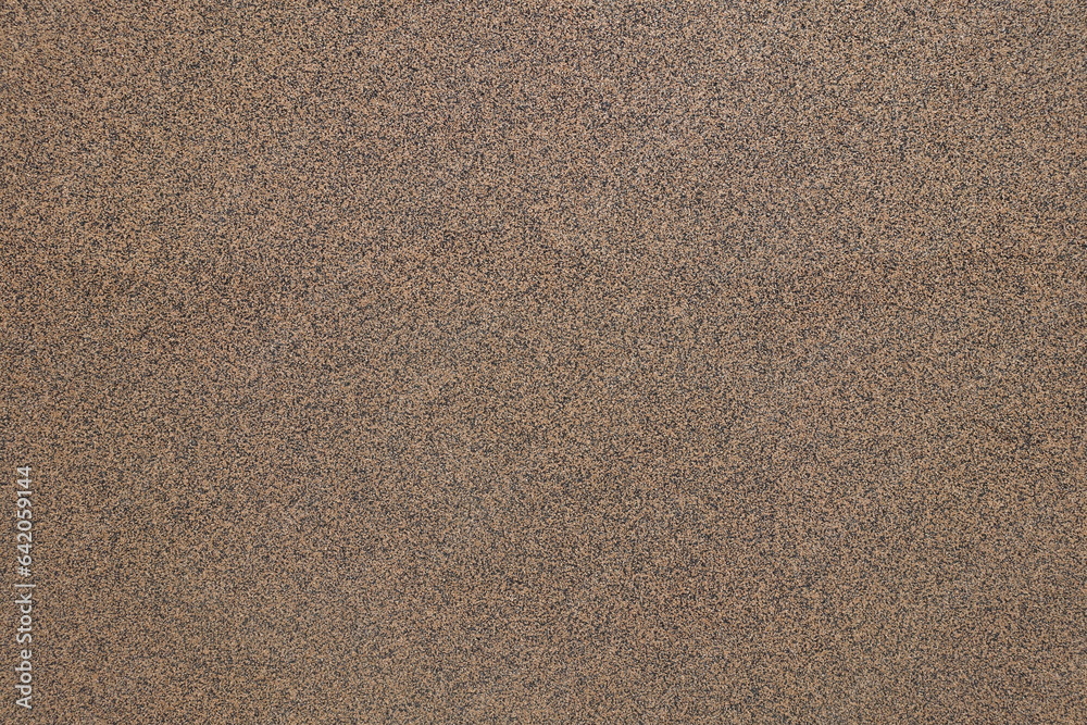 Texture of wall with coarse brown and black pebbledash finish - obrazy, fototapety, plakaty 
