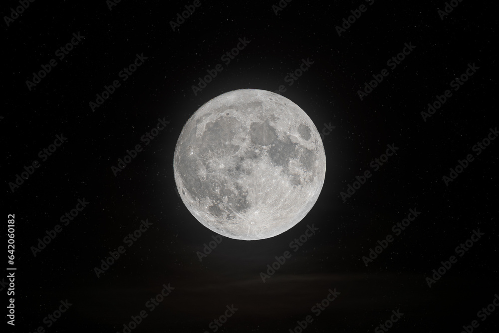 Picture of the shiny super moon with stars and clouds Picture of the shiny super moon with stars and clouds