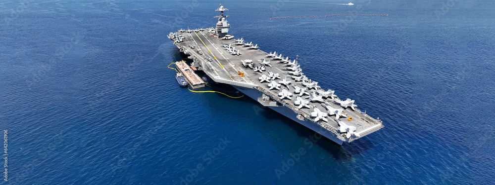 Εκτύπωση καμβά Aerial drone ultra wide panoramic photo with copy space of latest technology nuclear powered aircraft carrier USS Gerald R
