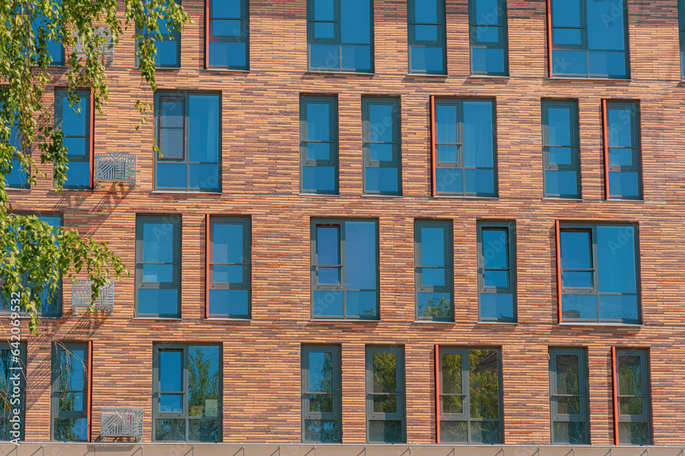 Facade of a modern residential building, building texture Facade of a modern residential building, building texture