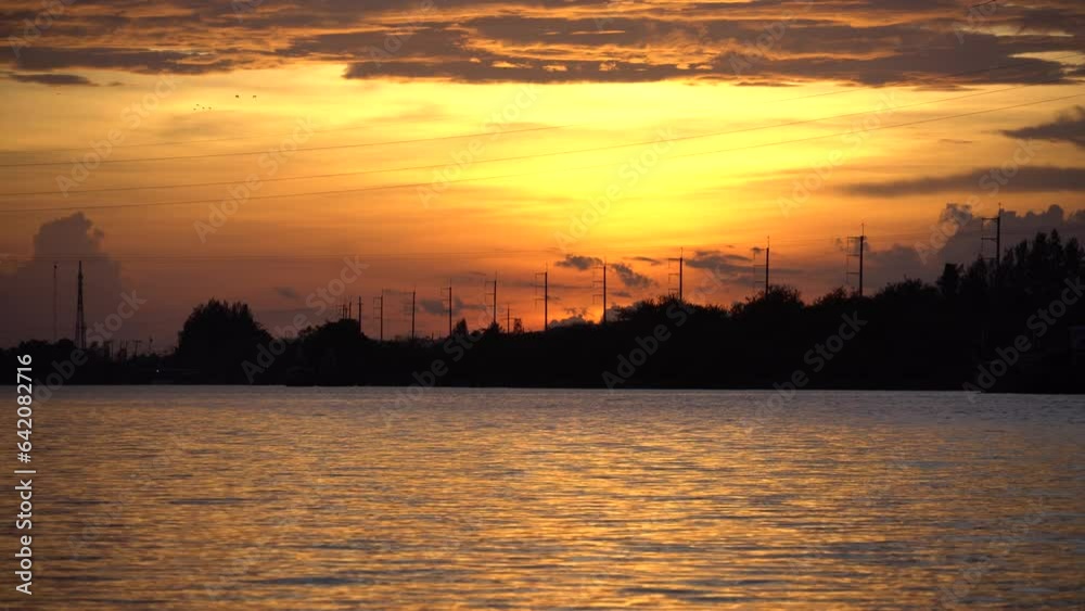 birds fly over the sunset and the river birds fly over the sunset and the river