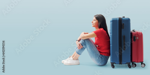 Young traveler woman and luggage photo