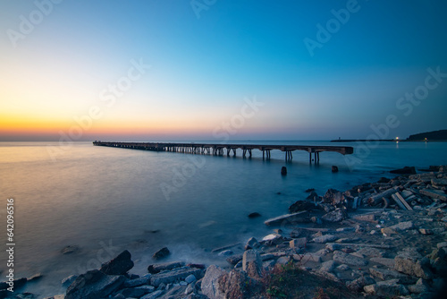 long exposure of old and abandoned pier. Beautiful sunset and light in Filyos beach of in Zonguldak    