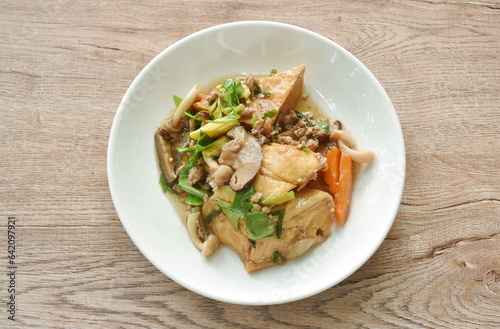 deep fried tofu with mashed pork and black ear mushroom with celery on plate 
