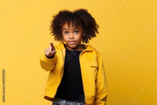 Look There. Black Elementary Student Girl Pointing Finger