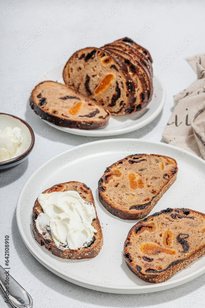Sweet bread with raisins, dried apricots, dates, figs. Healthy ingredient for sandwiches, breakfast