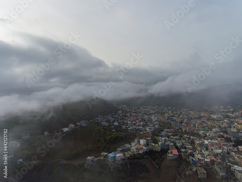 Aerial photos of Assomada in Santiago Island, Cabo Verde, reveal the vibrant culture, colorful markets, and stunning mountain landscapes of this historic town. The bird's-eye view captures the essence photo