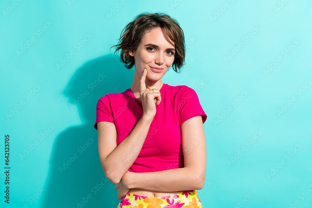 Portrait of gorgeous creative lady finger touch chin brainstorming ponder isolated on turquoise color background Portrait of gorgeous creative lady finger touch chin brainstorming ponder isolated on turquoise color background