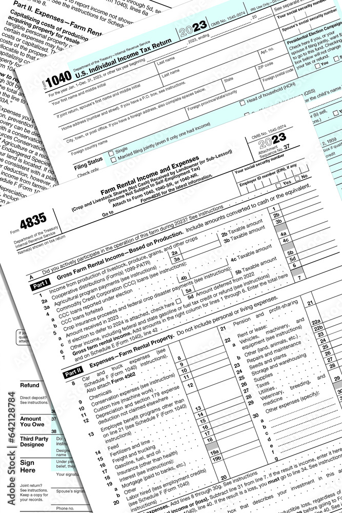 custom made wallpaper toronto digital2023 IRS tax forms stacked on a desk top.