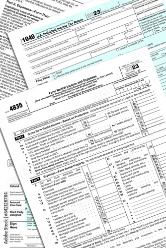 Wallpaper Mural 2023 IRS tax forms stacked on a desk top. Torontodigital.ca