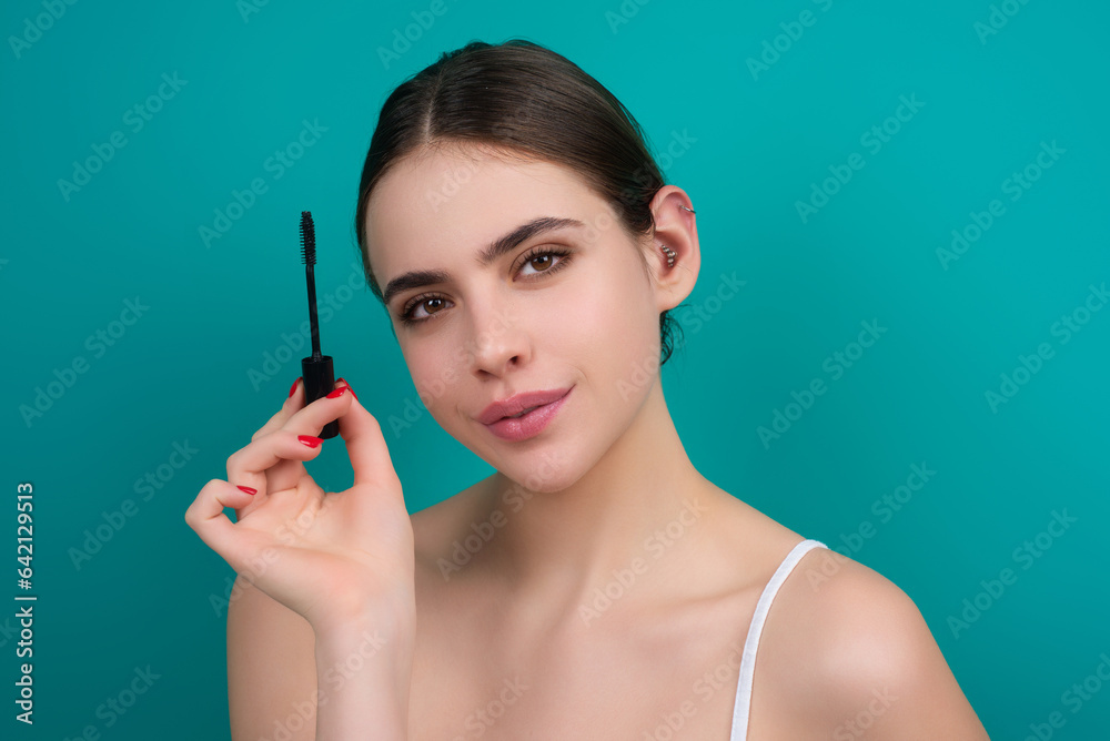 Woman with long eyelashes hold eyelashes brush. Eyelashes lamination. Lashes beauty procedures. Combs eyelashes with a brus, eyebrow eye line. Woman with long eyelashes hold eyelashes brush. Eyelashes lamination. Lashes beauty procedures. Combs eyelashes with a brus, eyebrow eye line.