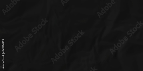  Dark crumple black paper wrinkled poster template ,blank glued creased paper texture background. black paper crumled backdrop background. used for cardboard and clarkboard.