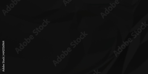 	
Dark crumple black paper wrinkled poster template ,blank glued creased paper texture background. black paper crumled backdrop background. used for cardboard and clarkboard.