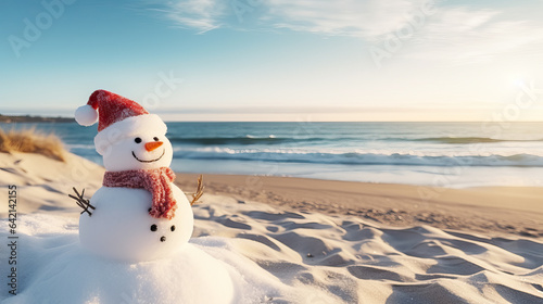 Snowman in a Santa Claus hat on a sandy white beach on the Caribbean Sea. Celebration of the New Year in warm countries. Travel.