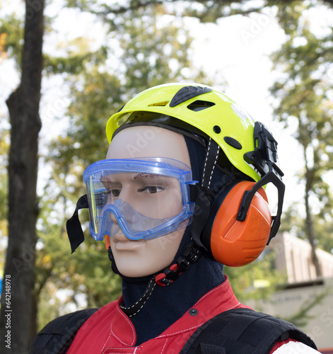 Protective plastic helmet on mannequin with protective glass.  © Irina