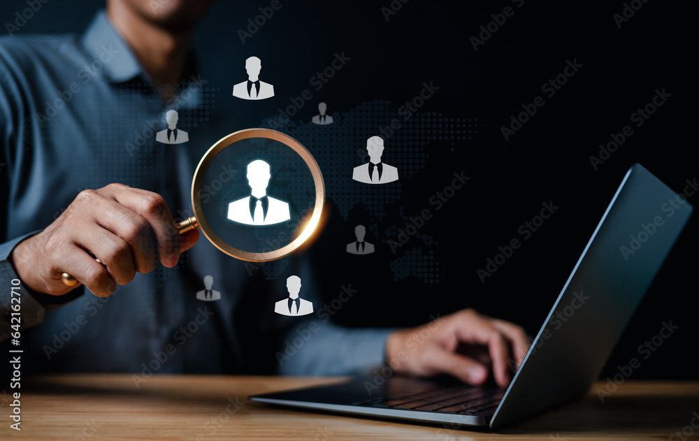 Naklejka premium search, seek, hr, find, human, talent, management, resource, choose, executive. a man hold magnifier to finding seeking human talent put into right job. around choosing that has human symbolic.