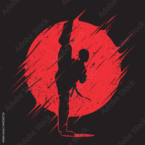 martial arts silhouette kicking with the moon brush strokes suitable for t-shirt design