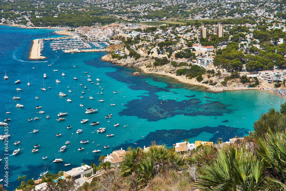 Moraira view from cap d'or with many boats
