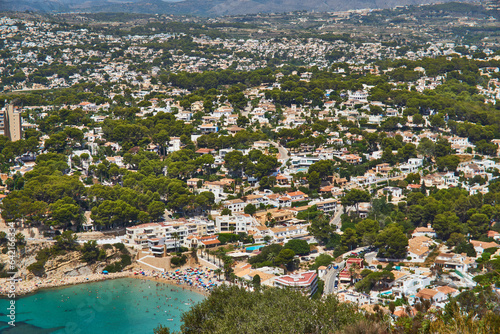 Moraira view from cap d'or with many boats © simon