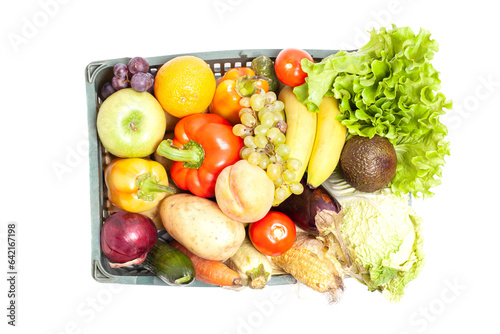 Fresh ripe vegetables and fruits in crate isolated on white background top view