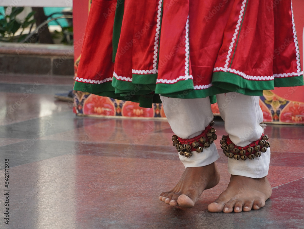 a rajasthani boy is wearing rajasthani dress and anklet bells on his feet Murtahl, Delhi, India- 15 Oct ‎2023 :