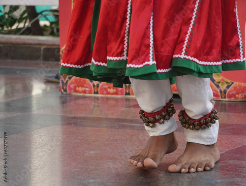 a rajasthani boy is wearing rajasthani dress and anklet bells on his feet Murtahl, Delhi, India- 15 Oct ‎2023 :
