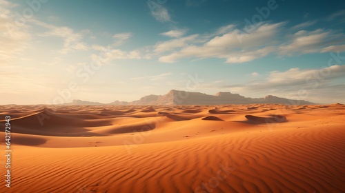 A breathtaking desert landscape with majestic sand dunes and distant mountains © Tremens Productions